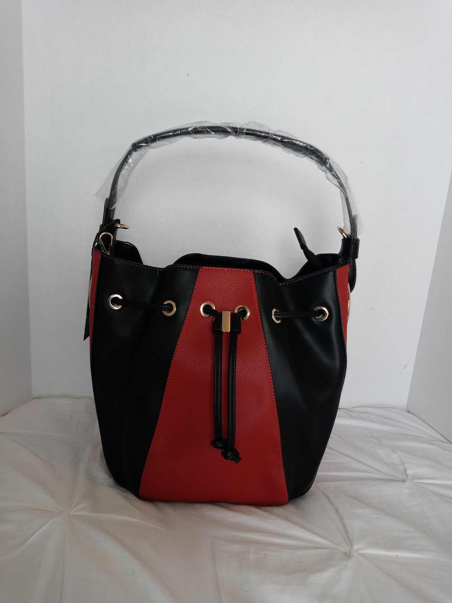 Black faux leather handbag